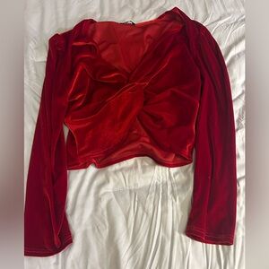 Red cropped blouse. Never worn. Size 4X. Slightly tight fitting